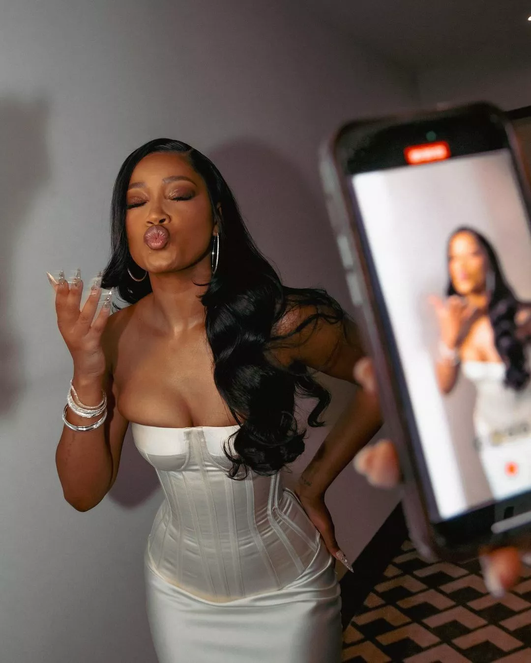 Keke Palmer showing off her gem-encrusted French manicure
